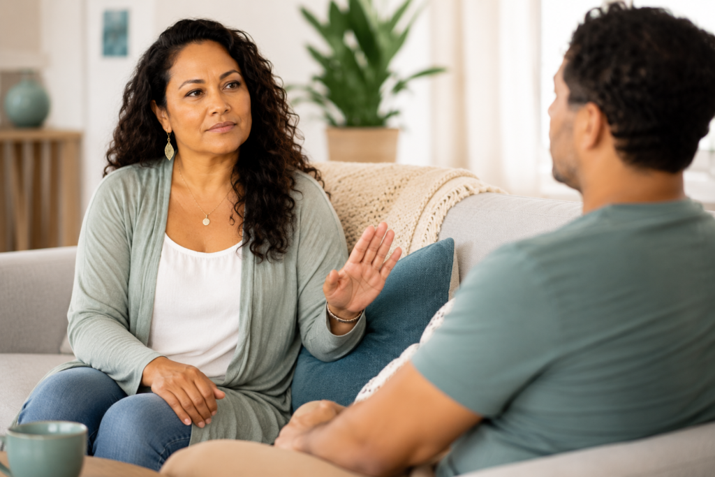 Communicating Boundaries with Calm and Clarity Woman calmly communicating a boundary during a serious conversation with a loved one